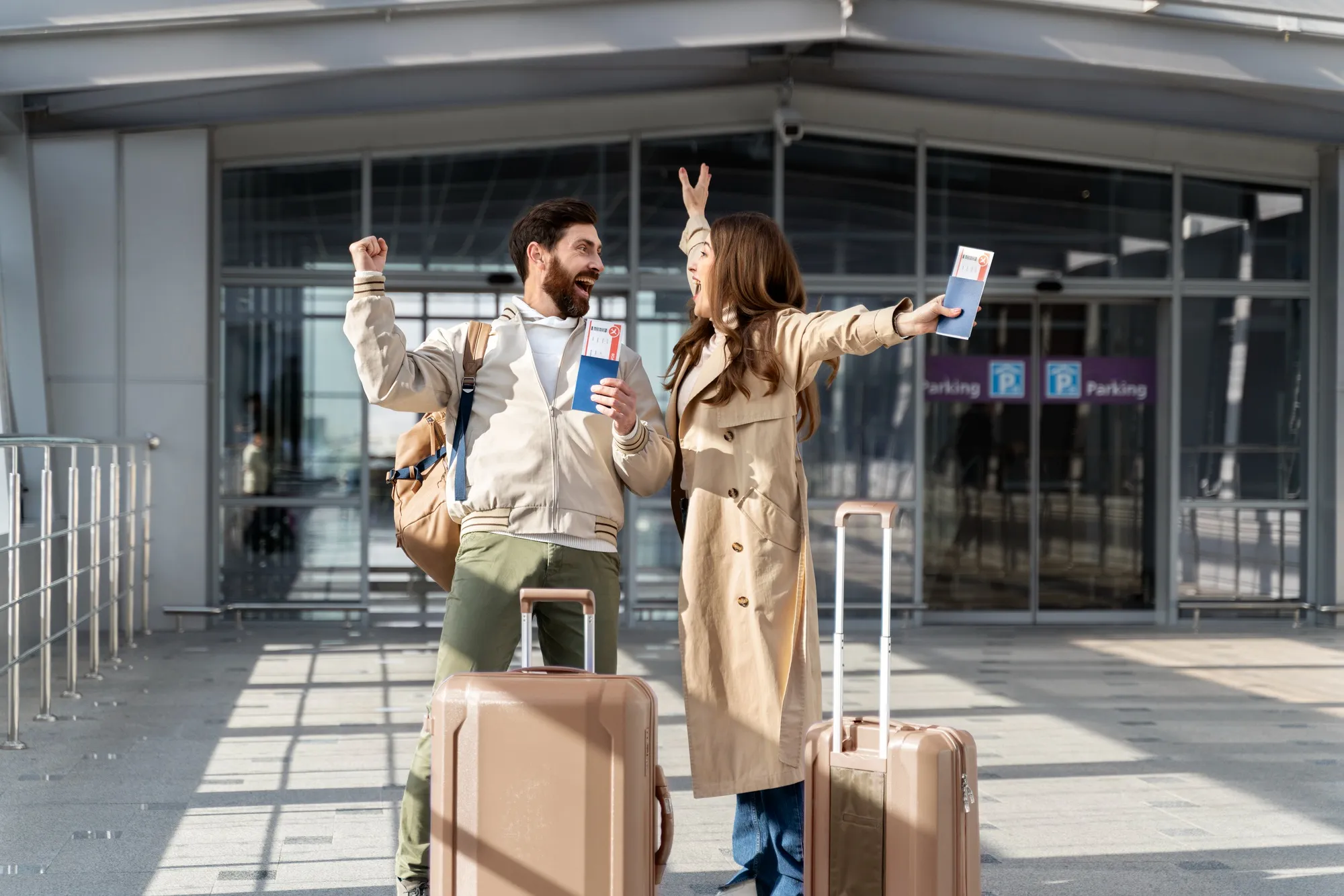 The image shows a young couple at the airport ready to depart.